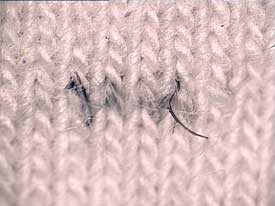 Fabric contaminant