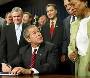 NCC Chairman Kenneth Hood (in back of room) was among those witnessing President Bush sign the Farm Security and Rural Investment Act of 2002.