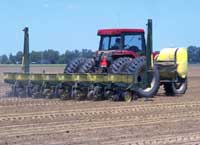 tractor preparing the soil for planting